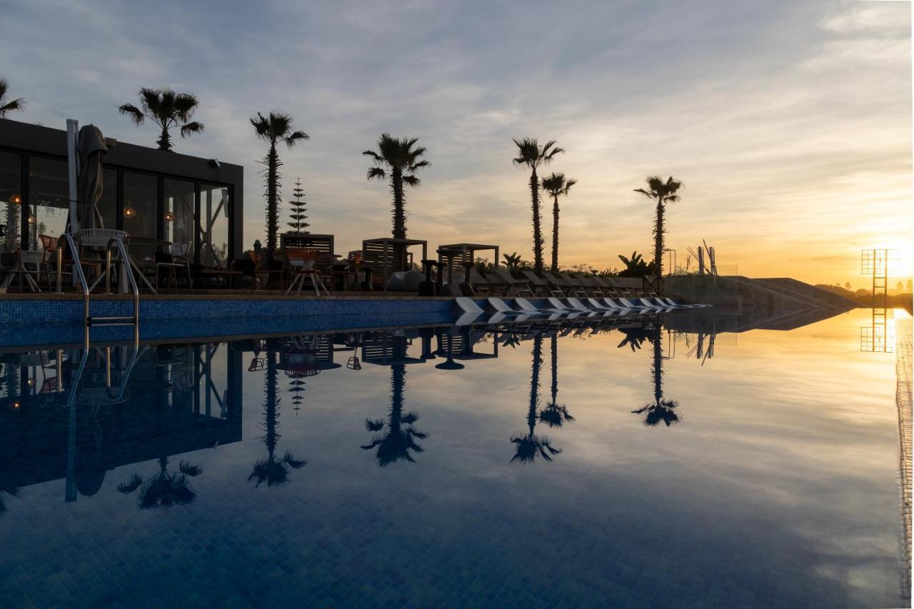 Pullman Mazagan Royal Golf & Spa El Jadida Exteriör bild Sunset at the pool