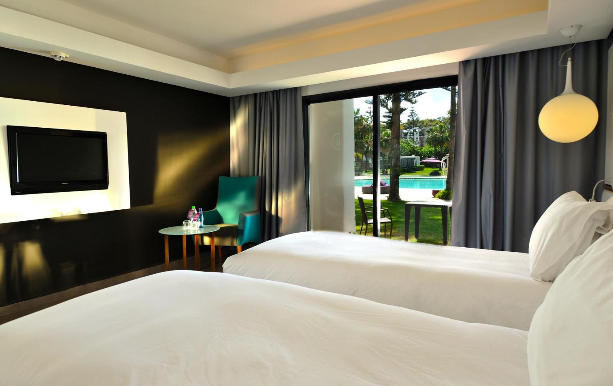 Pullman Mazagan Royal Golf & Spa El Jadida Exteriör bild A room at the hotel