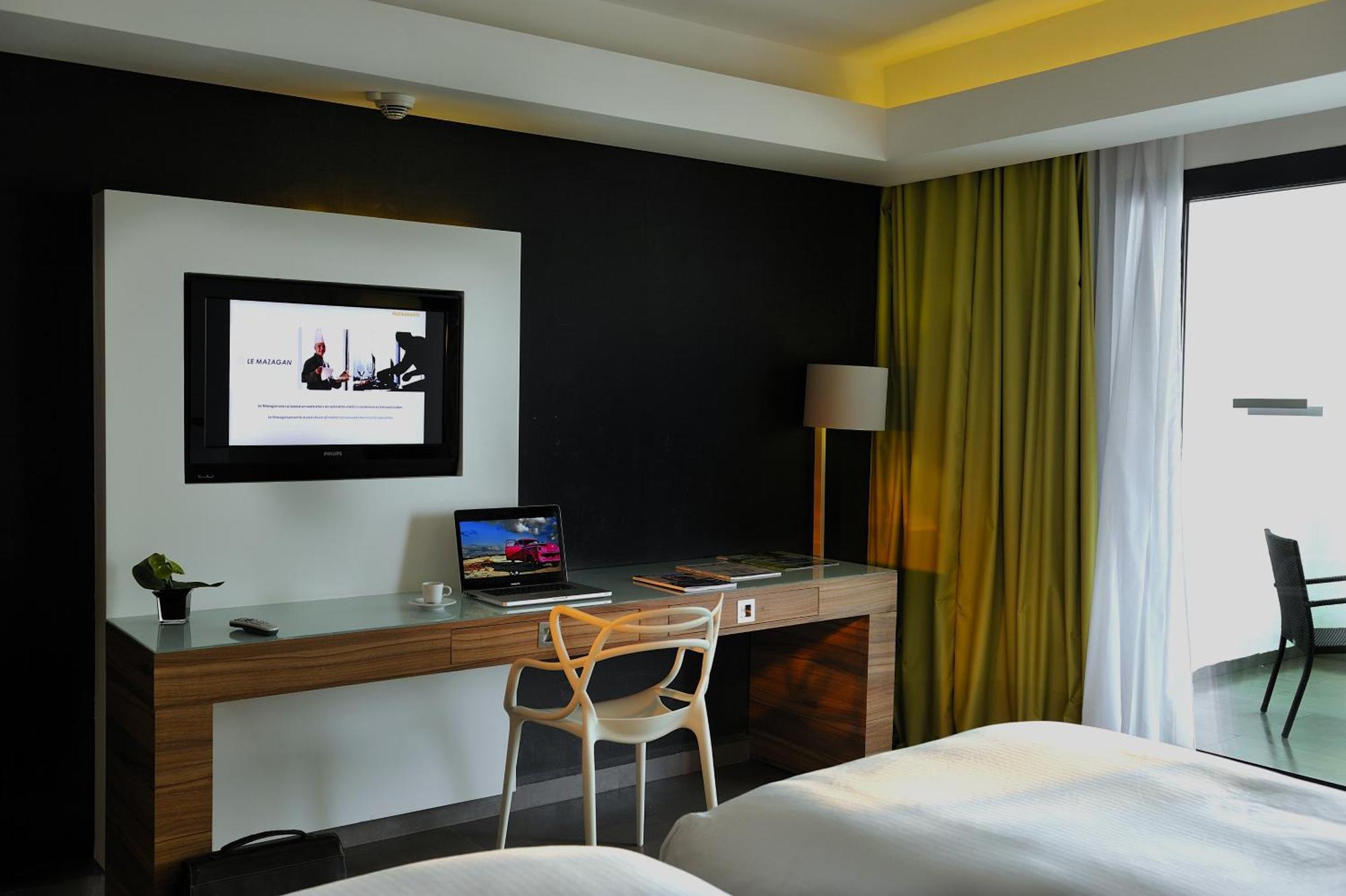 Pullman Mazagan Royal Golf & Spa El Jadida Exteriör bild A room at the hotel